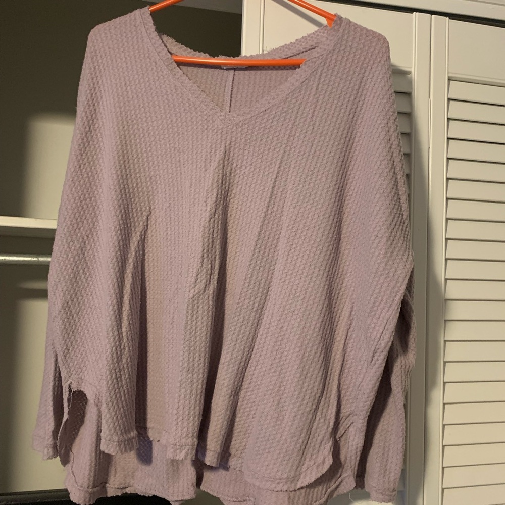 a light purple sweater, size medium